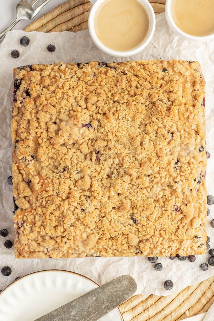 Baked huckleberry sourdough coffee cake with coffee.