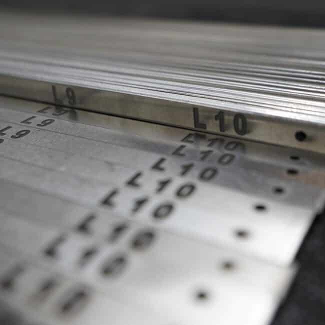 Metals stamping and engraving samples for custom design and personalization.