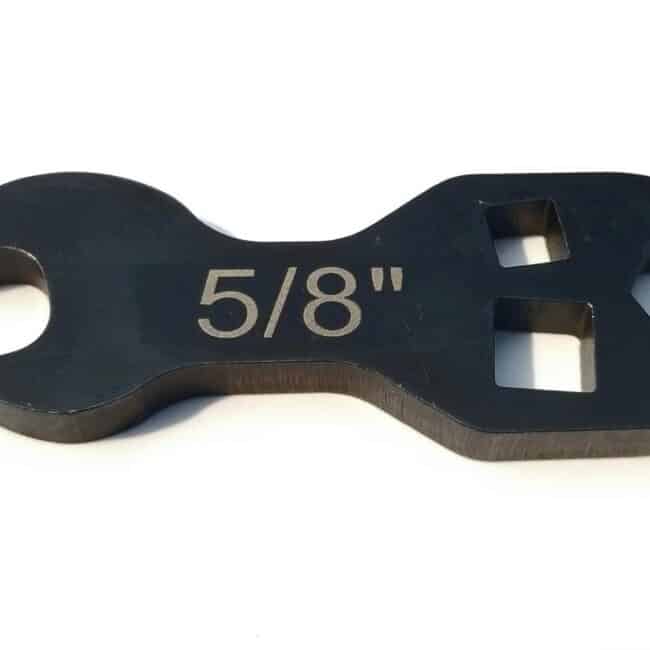 Wrench-shaped tool with 5/8 inch size engraving for engraving or metalworking projects.