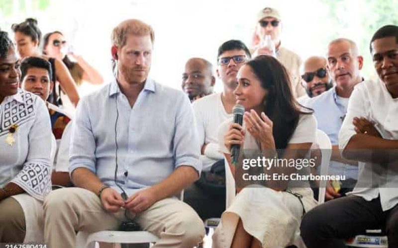 Prince Harry and Megan Markle on an organization fundraising meeting