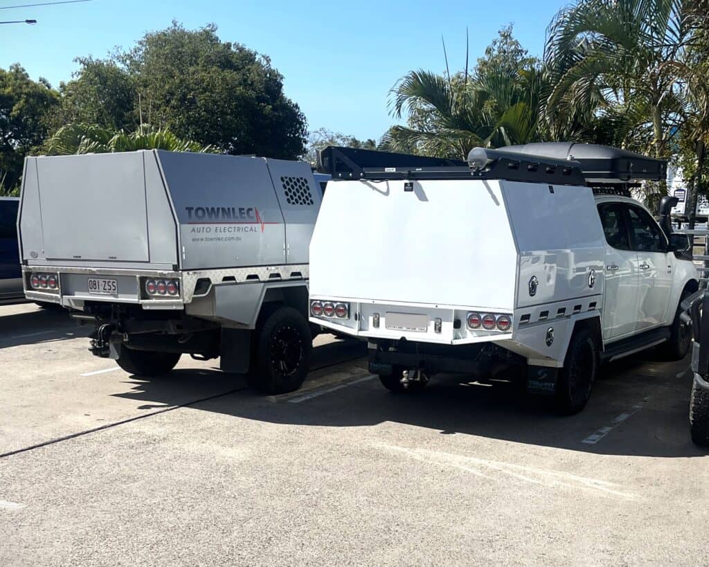 Auto electrical service truck with specialized equipment.