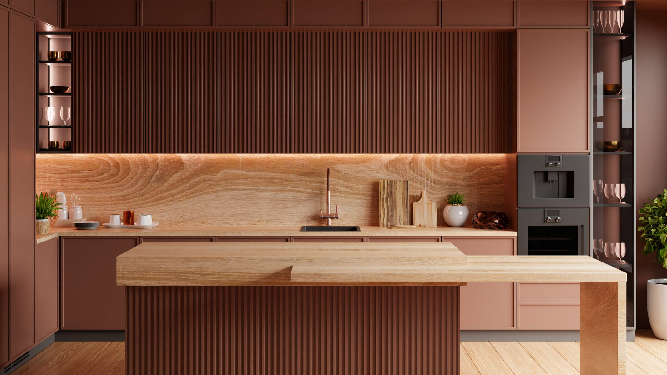 Modern kitchen with wood island, brown cabinets, and light wood countertops