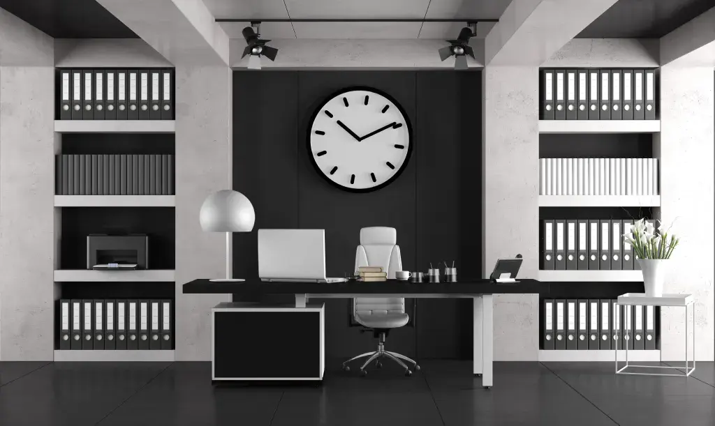 Modern black and white office with large clock and organized shelves