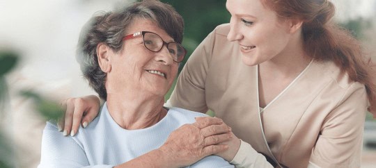 Adult Mother And Her Daughter Smiling