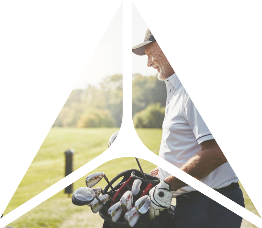 triangle shape over image of man with golf bag