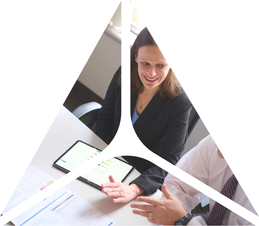 triangle shape over image of 2 business people talking