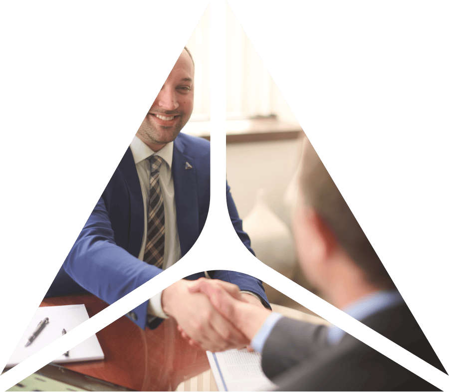 triangle shape over image of two business people shaking hands