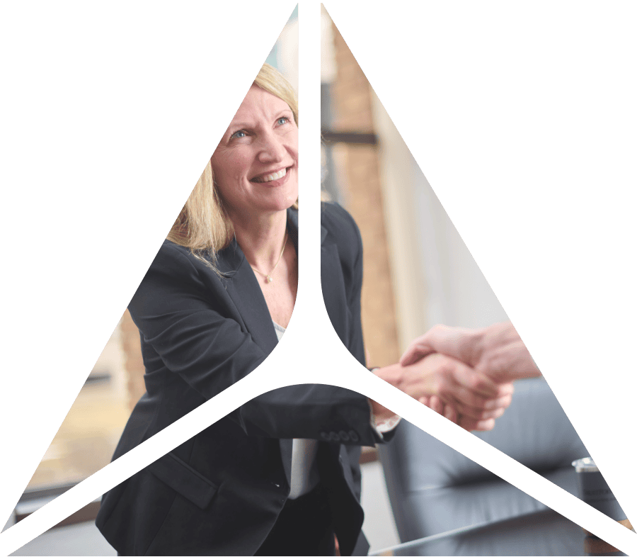 Business professional woman shaking client's hand