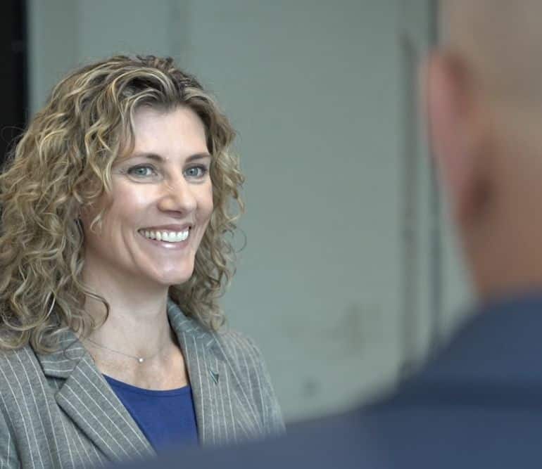 Julie Westbrock of Trust Point talking with a client