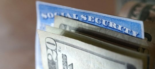 Social Security Card and 20 dollar bills