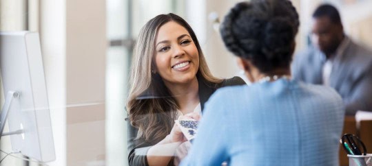 Woman working with a 401k professional