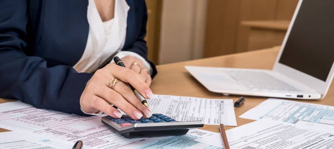 Woman calculating taxes