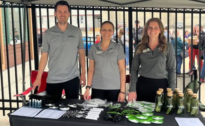 Emerj360 and Trust Point team members at a La Crosse Loggers Game