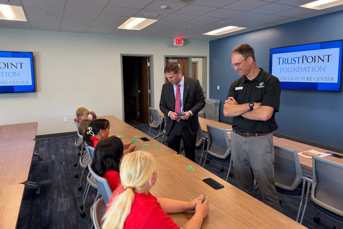 Bill Bosch and BGC Staff Take Part in a Financial Literacy Activity at the Financial Future Center