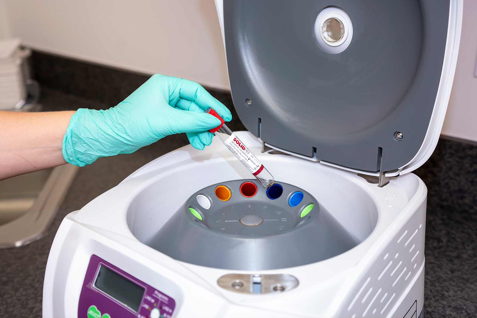 Inserting a biologics tube for processing