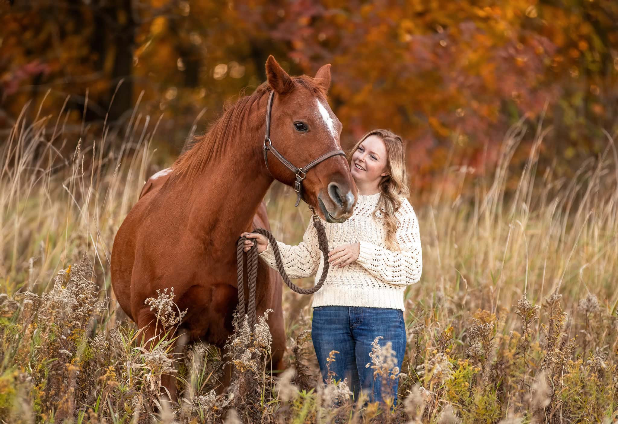 girl standing with her horse
