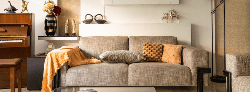 throw and pillows on sofa