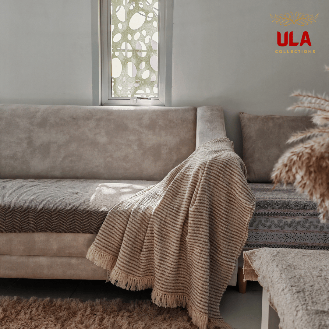 Olive green striped cotton throw blanket with decorative fringe, breathable summer blanket for modern living rooms by ULA Collections.