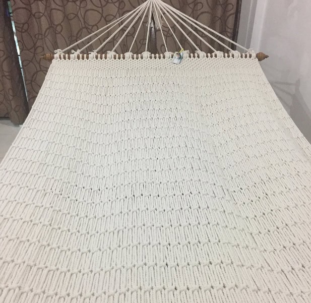 white rope hammock with wooden stand indoor