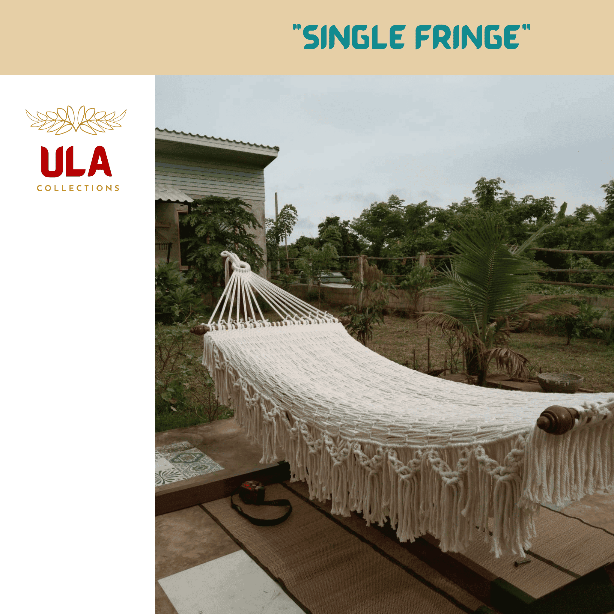 Outdoor beige cotton rope hammock with thick fringe and wooden ends.