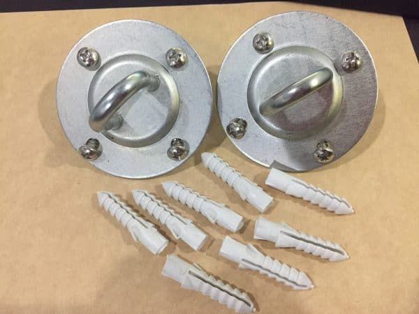 Set of two stainless steel pad eyes/eye plates with four screw holes, includes screws and eight plastic wall anchors for ceiling or wall mounting.