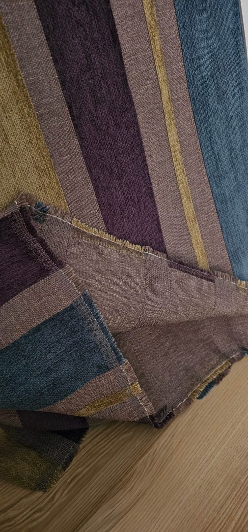 Striped woven upholstery fabric with blue, purple, brown, and gold colors
