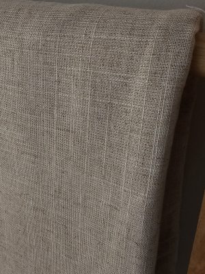 Natural **light beige linen-look** or **hemp-look upholstery fabric** with visible texture