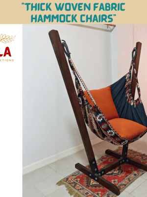 Navy and orange Native design woven hammock chair on a wooden stand