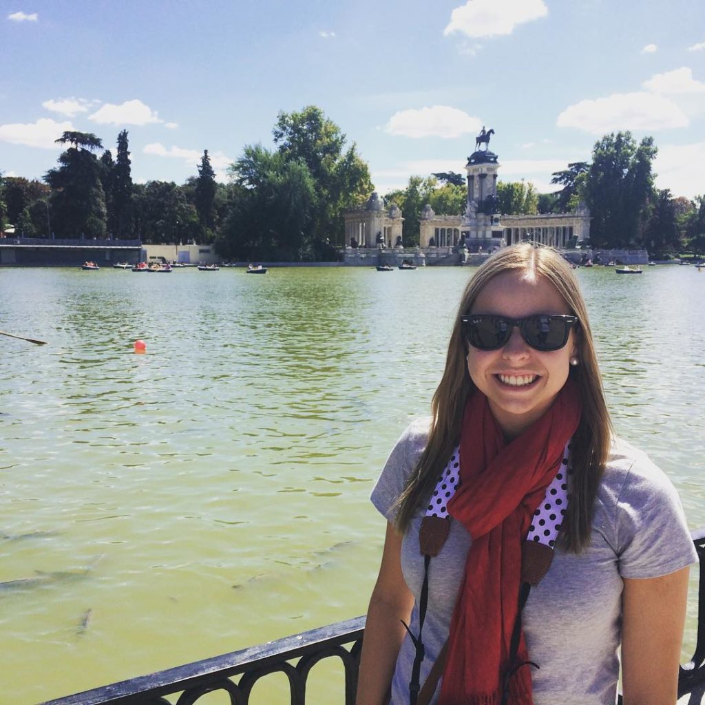 Woman smiling in Buen Retiro Park in Madrid