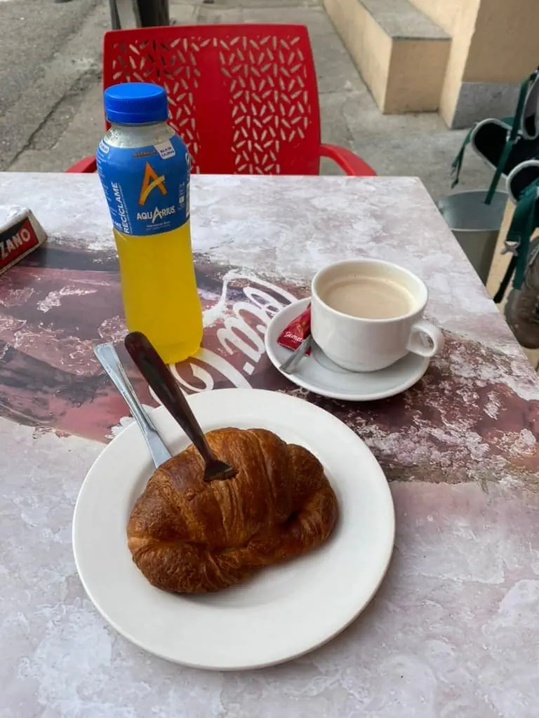 Croissant, coffee, and Aquarius sports drink along the Camino de Santiago