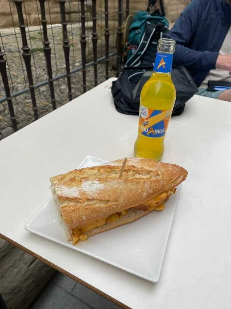 Bocadillo sandwich with an orange Aquarius sports drink along the Camino de Santiago