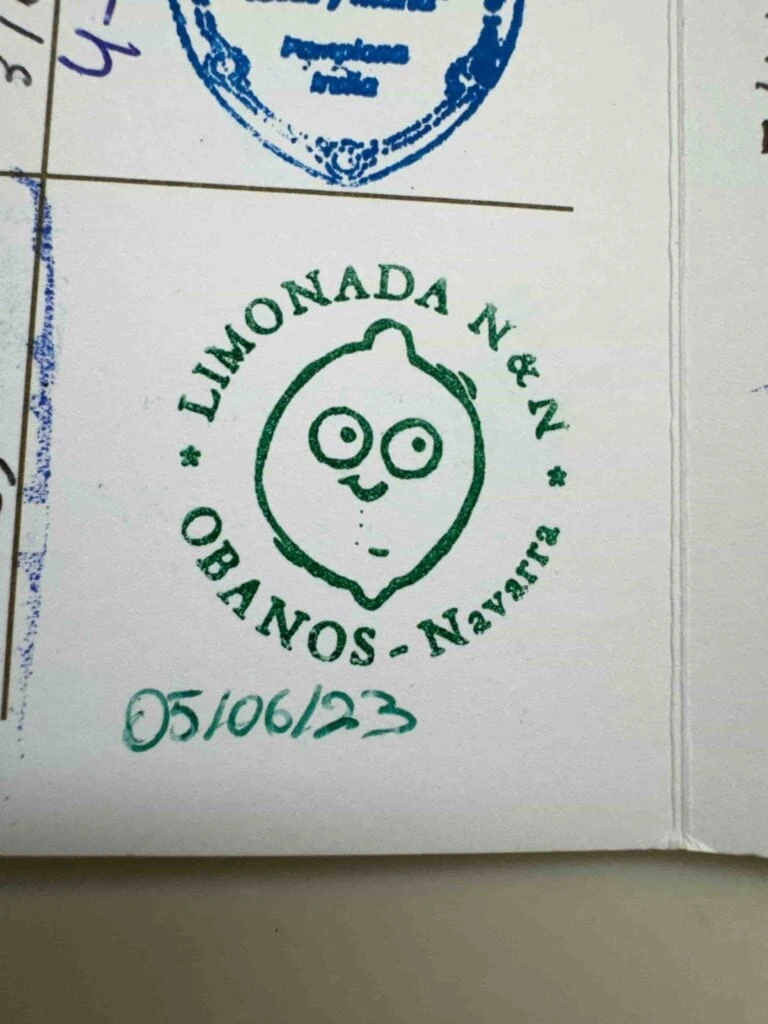 A stamp with a smiley face lemon in a passport