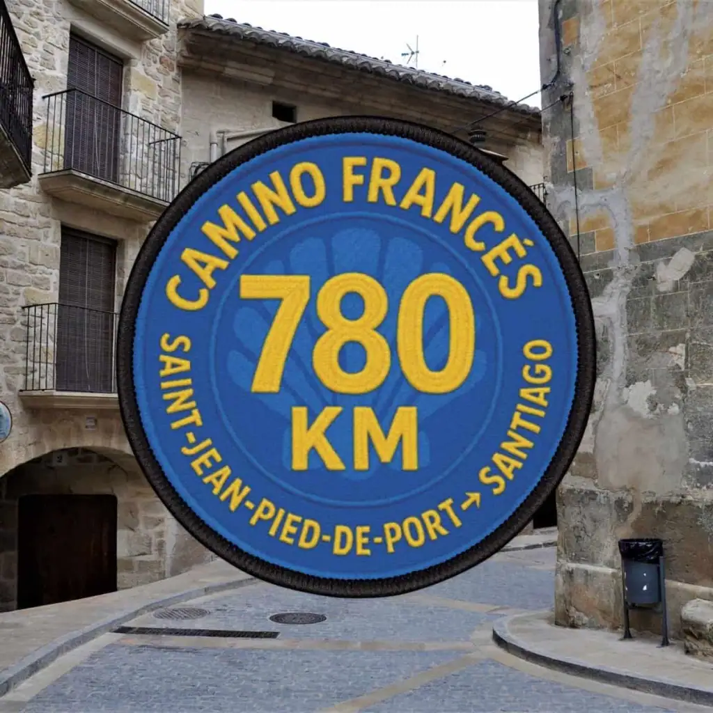 Blue patch that says "Camino Francés 780 km Saint-Jean-Pied-de-Port - Santiago"