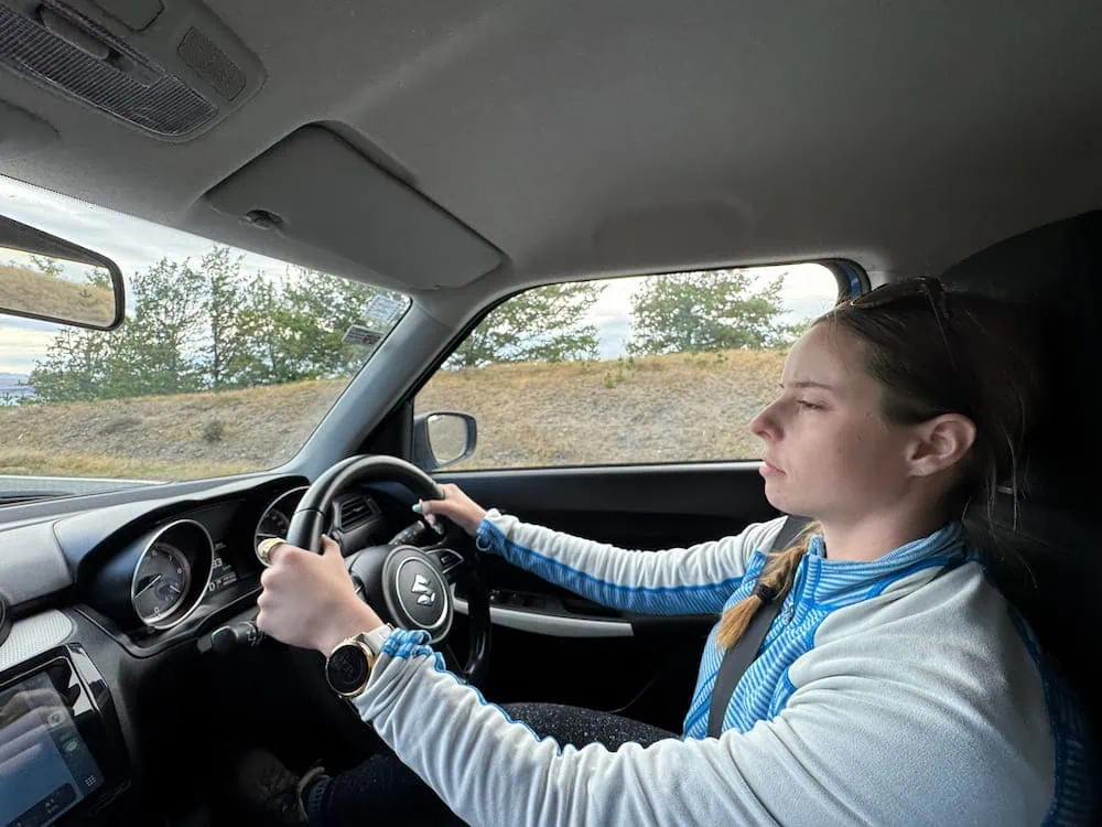 Mikala driving from the right side of the car in New Zealand.