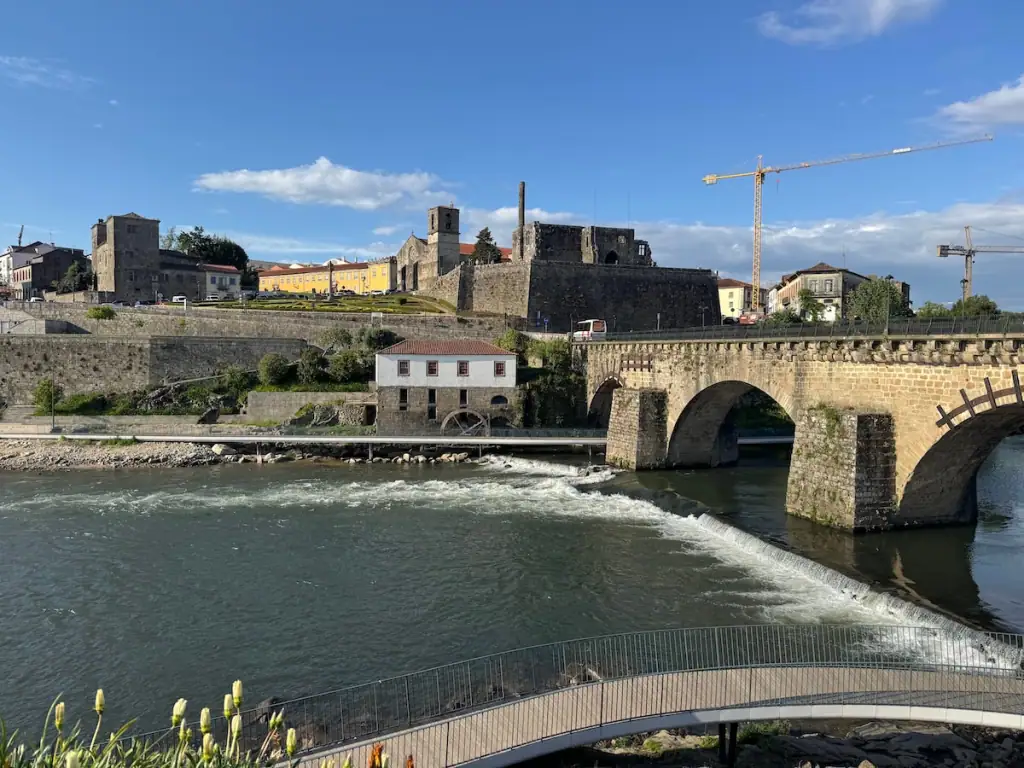 View of a bridge over a river and Barcelos taken from Barcelinhos while on the Camino Portugués Central route.