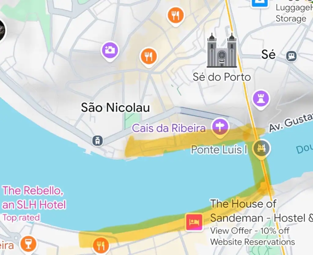 Google Maps screenshot of Porto, Portugal, with several areas highlighted yellow for recommended walking: just north of the river, the Dom Luís I Bridge, and just south of the river.