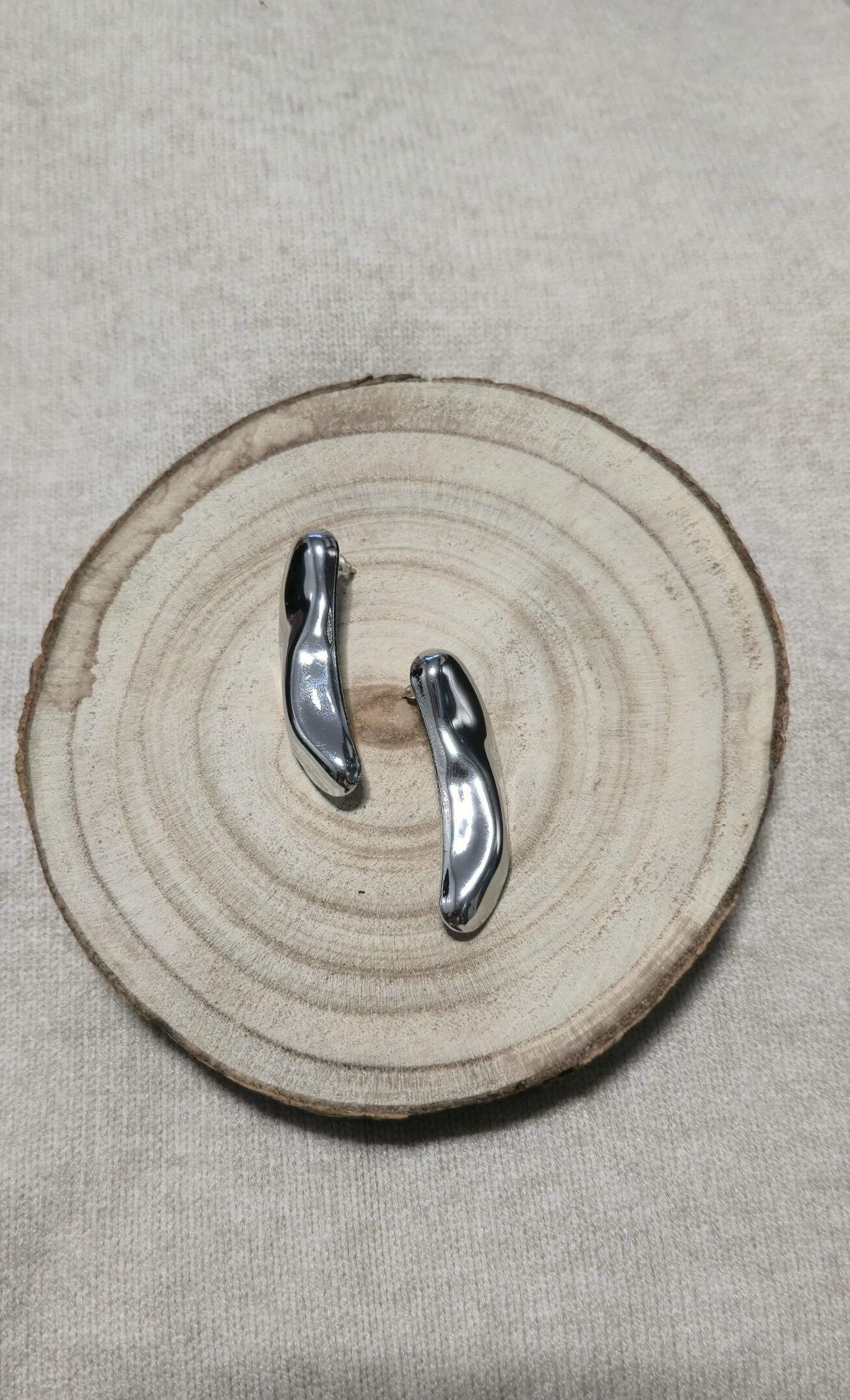 Pendiente acero plateado