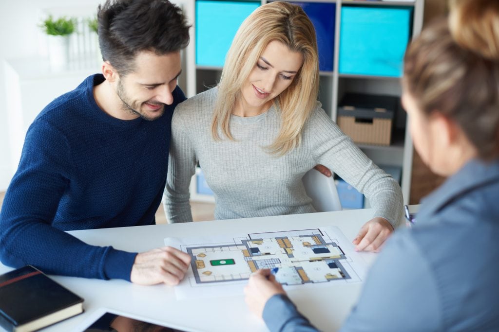couple-meeting-with-real-estate-agent-2021-08-26-20-15-26-utc