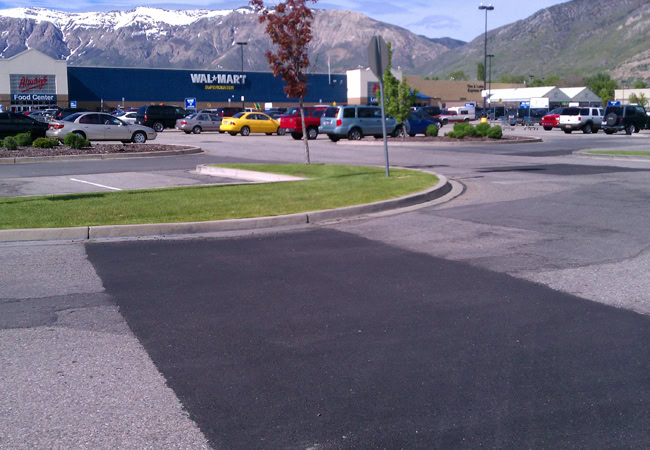 asphalt patching and repair of parking lot in roy utah
