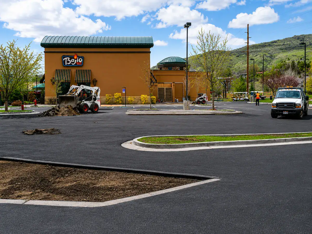Commercial asphalt patching and parking lot repair project at a Utah restaurant property.