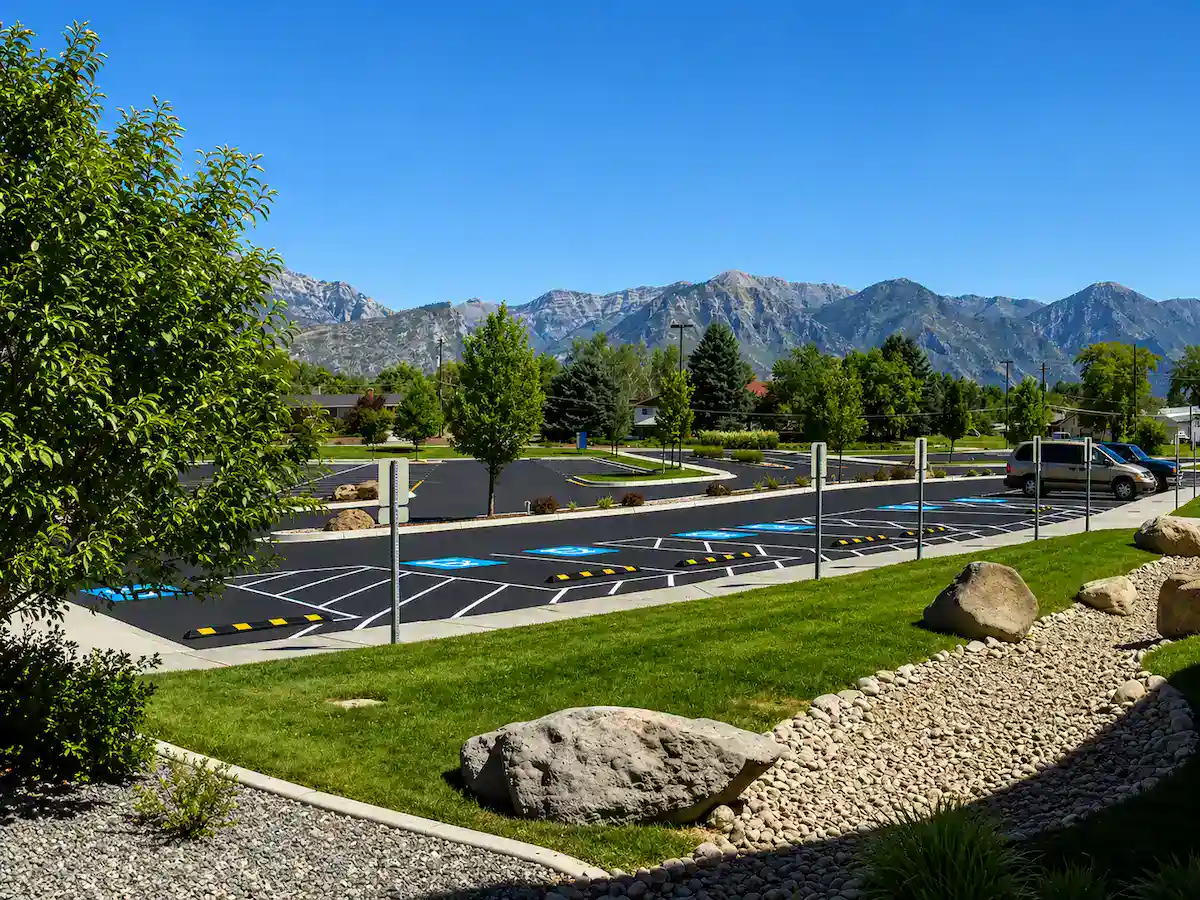 Utah parking lot striping with mountain views and fresh asphalt pavement