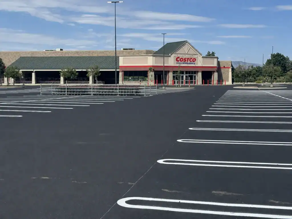 Freshly sealcoated and striped Costco parking lot in Orem, Utah, after a 345,000-square-foot maintenance project.