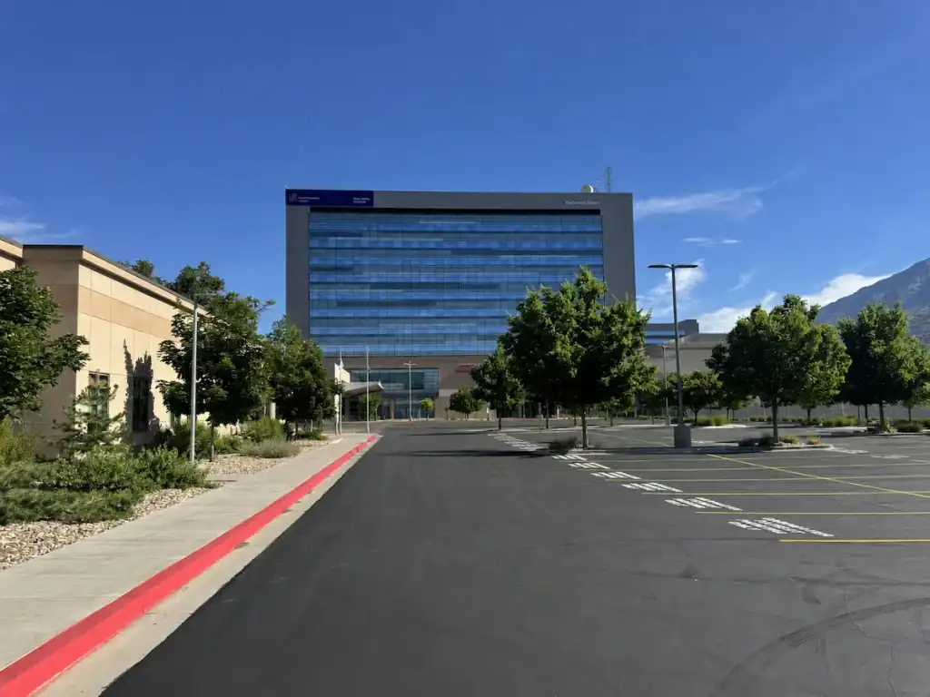 Freshly sealcoated and striped parking lot in front of the Pedersen Tower at Utah Valley Hospital in Provo, Utah.