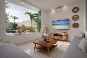 Villa tropis modern dengan pemandangan rooftop GWK dan sunset di Nusa Dua.