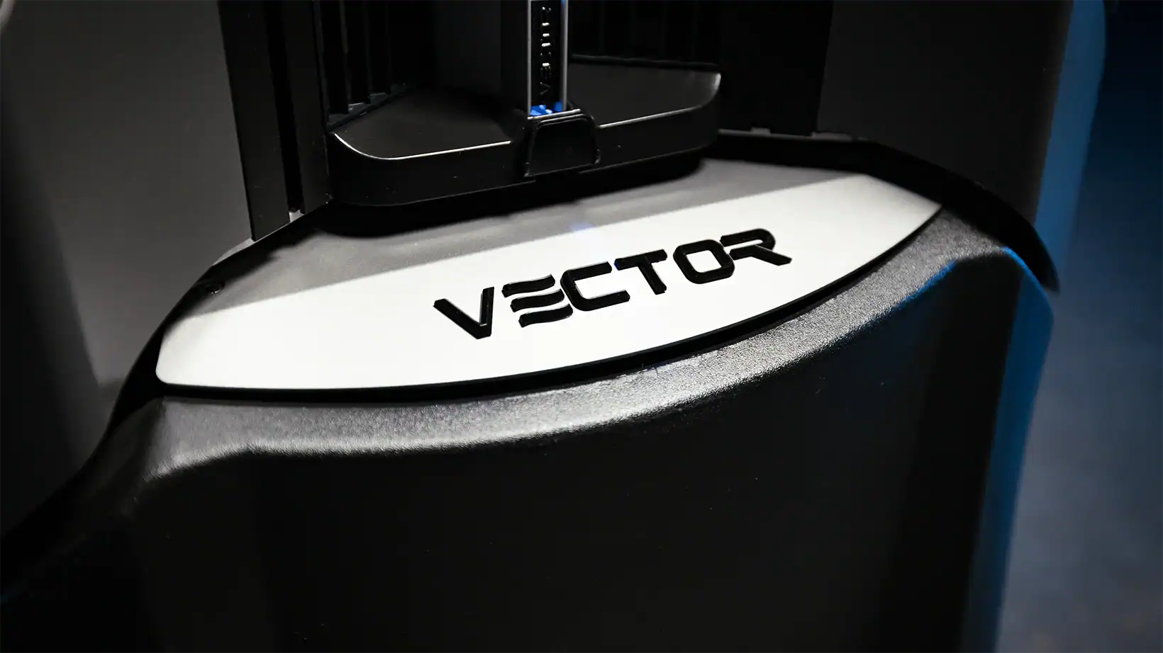 Close-up view of the Vector evaporative cooler logo engraved on the unit’s front panel