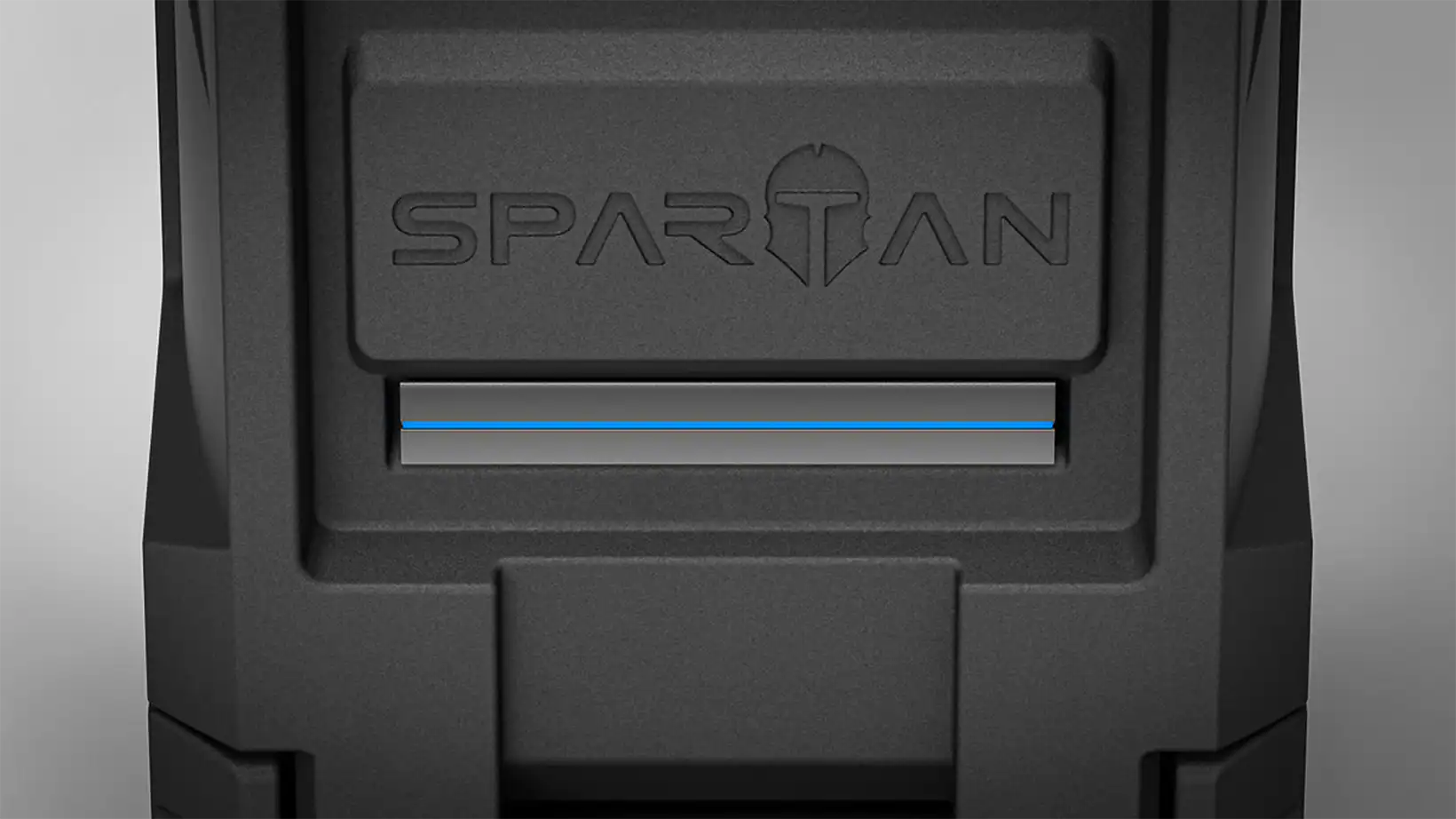 Close-up of Spartan evaporative cooler logo and illuminated blue accent bar on its rugged black exterior.