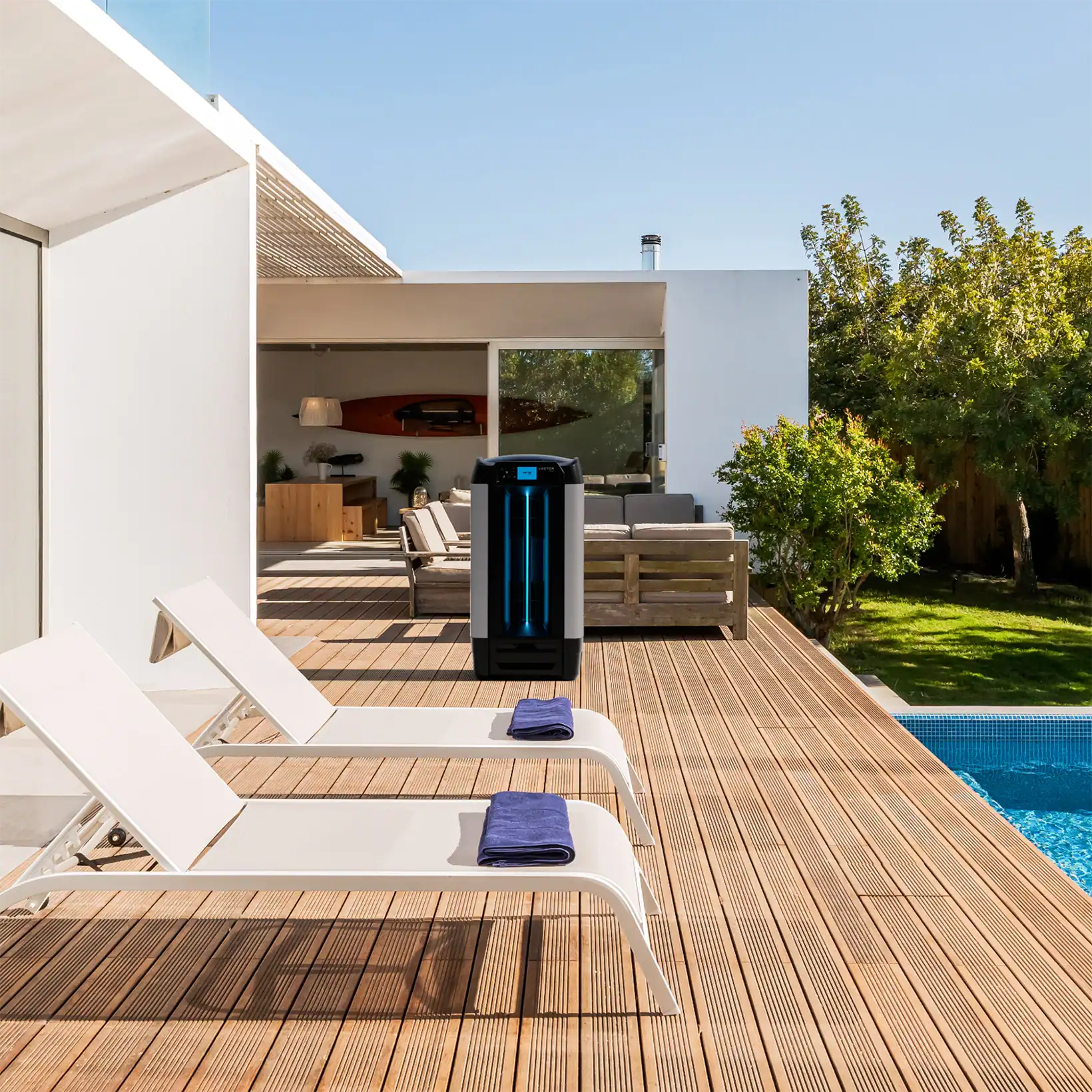 Aero evaporative cooler positioned on a modern poolside deck at a contemporary home