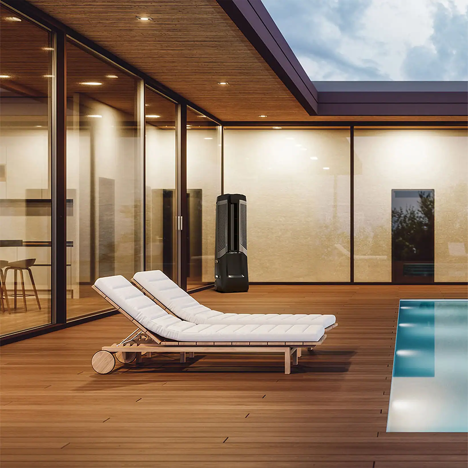 The Vector evaporative cooler positioned on a modern poolside deck beside lounge chairs, blending efficient cooling with contemporary outdoor design.
