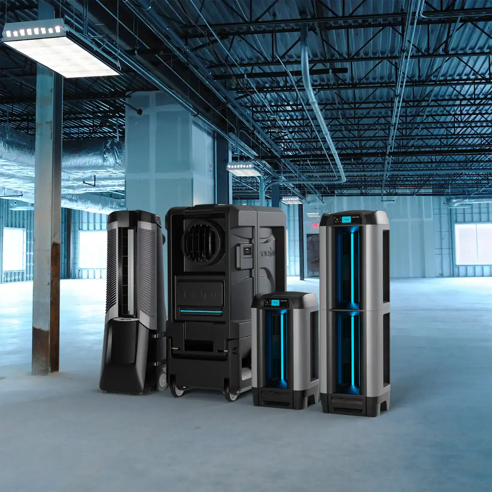 From left to right: Vector, Spartan, Aero, and Aero Pro evaporative coolers, featuring sleek industrial designs with blue LED accents in a warehouse space, representing Vector Climate’s full lineup of advanced cooling solutions