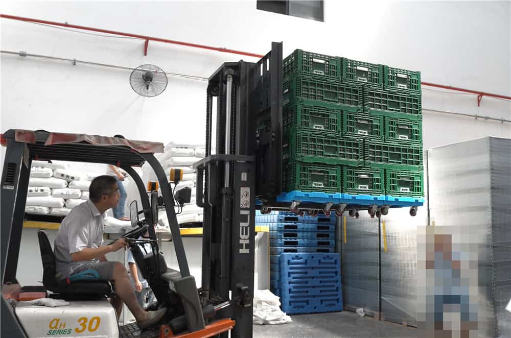 dolly carts are lifted by a forklift